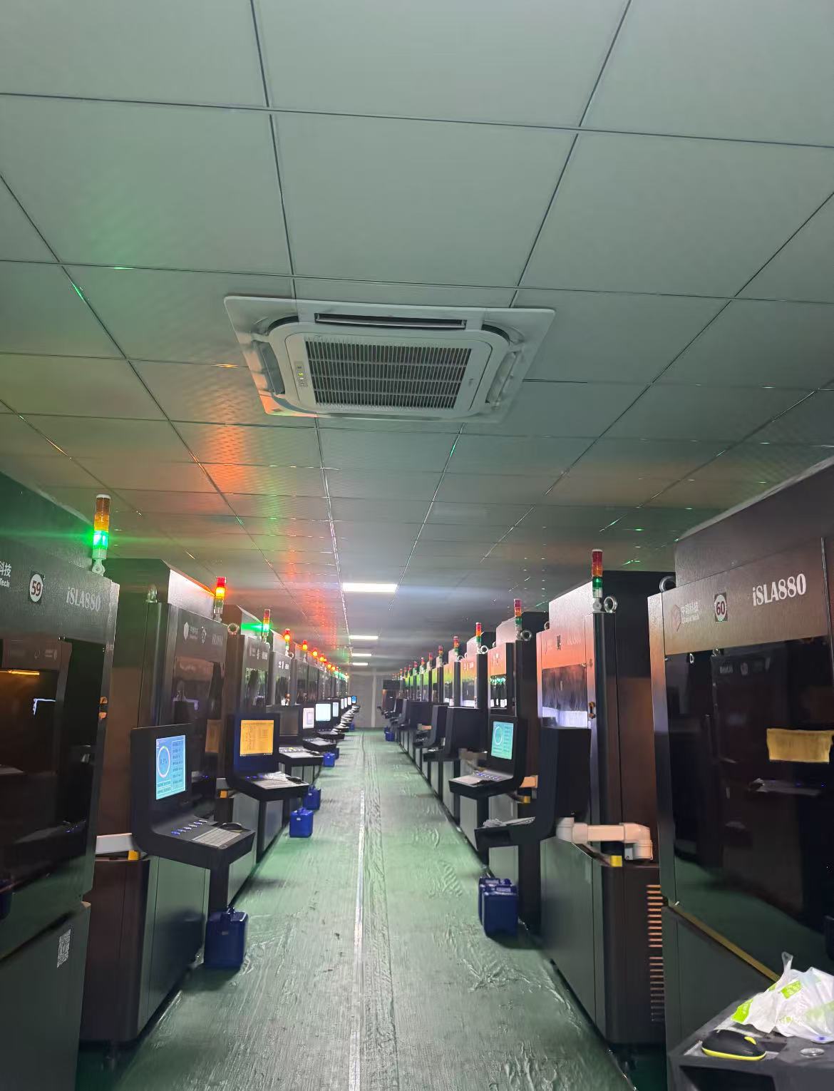 Rows of full-color 3D printing equipment in the PixoFig production facility