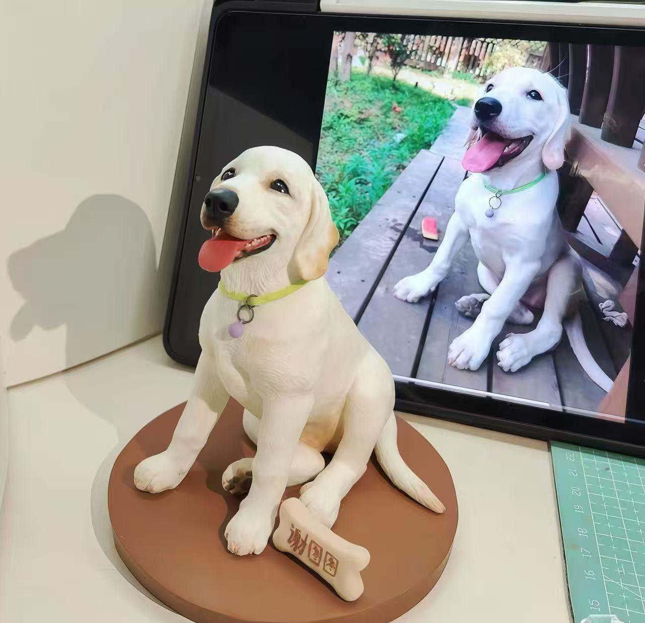 Custom Labrador figurine displayed with the original pet photo